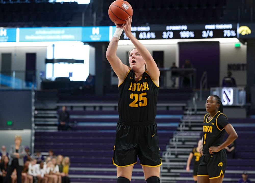 Iowa Hawkeyes forward Monika Czinano (25) makes a free throw during the first quarter of their game at Welsh-Ryan Arena in Evanston, Ill. on Sunday, January 5, 2020. (Stephen Mally/hawkeyesports.com)