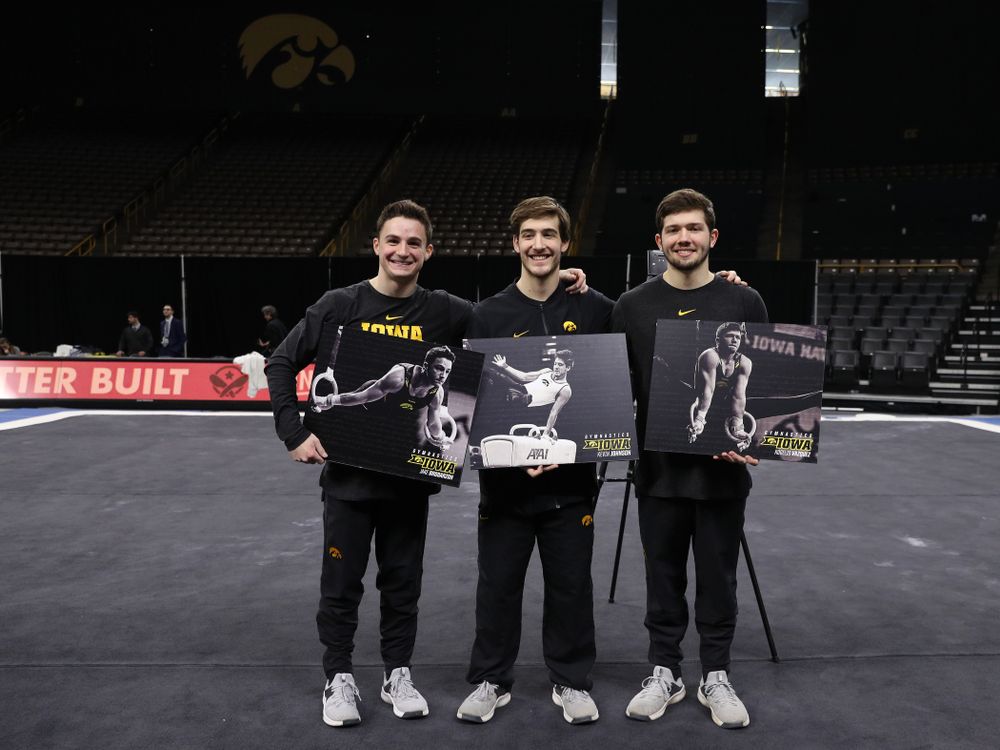 Iowa Men's Gymnastics seniors Jake Brodarzon, Kevin Johnson, and Rogelio Vazquez during senior day ceremonies following their meet against the Ohio State Buckeyes Saturday, March 16, 2019 at Carver-Hawkeye Arena. (Brian Ray/hawkeyesports.com)