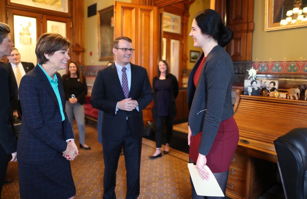 IowaÕs Megan Gustafson meets with Governor Kim Reynolds and Lt. Governor Adam Gregg at the Iowa State Capitol Wednesday, April 24, 2019 in Des Moines. (Brian Ray/hawkeyesports.com)