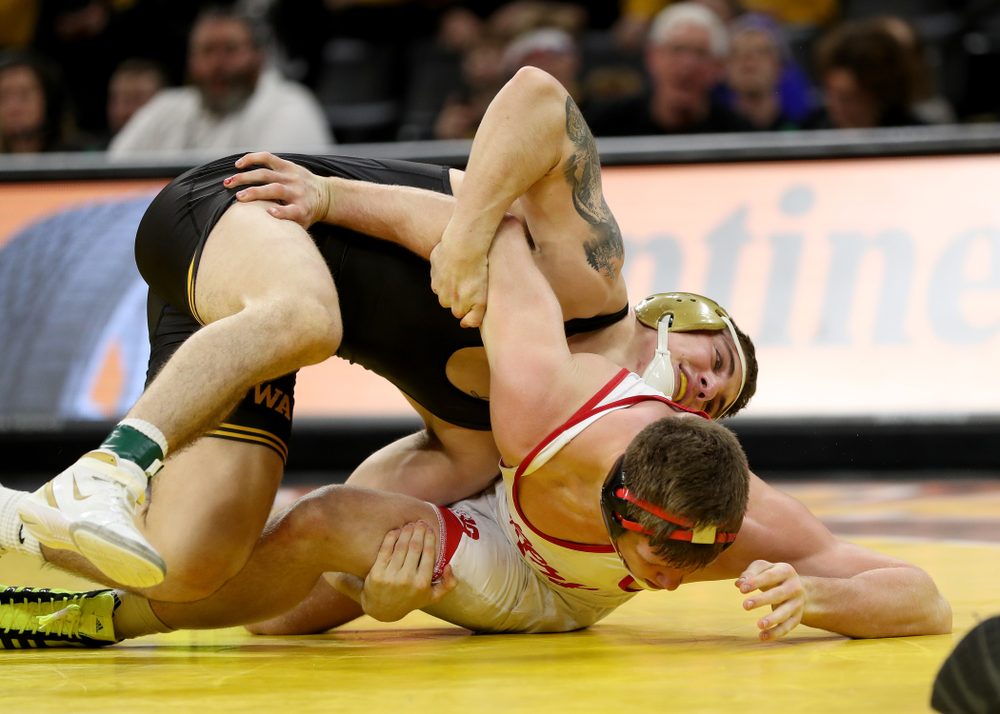 Iowa’s Abe Assad wrestles Nebraska’s Taylor Venz at 184 pounds Saturday, January 18, 2020 at Carver-Hawkeye Arena. Assad won the match 6-4. (Brian Ray/hawkeyesports.com)