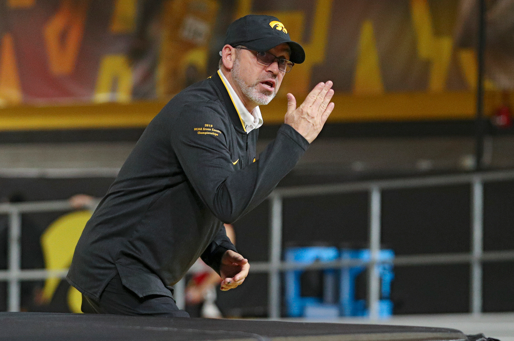 Iowa associate head coach Randy Hasenbank urges on his team during the women’s 3000 meter run event during the Hawkeye Invitational at the Recreation Building in Iowa City on Saturday, January 11, 2020. (Stephen Mally/hawkeyesports.com)
