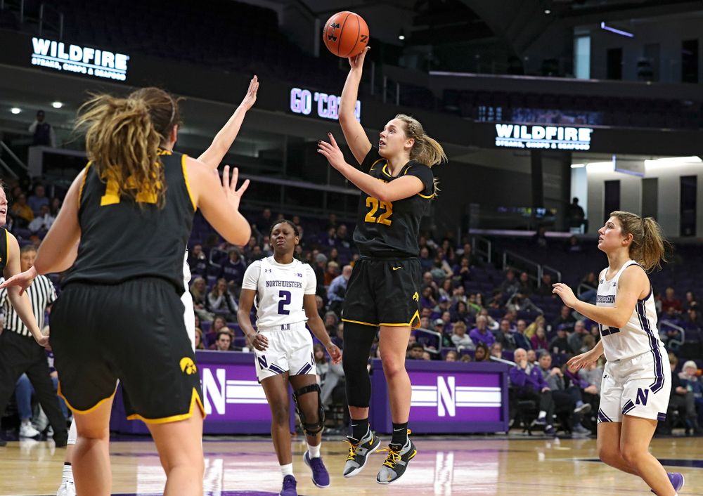 Iowa Hawkeyes guard Kathleen Doyle (22) scores a basket during the fourth quarter of their game at Welsh-Ryan Arena in Evanston, Ill. on Sunday, January 5, 2020. (Stephen Mally/hawkeyesports.com)