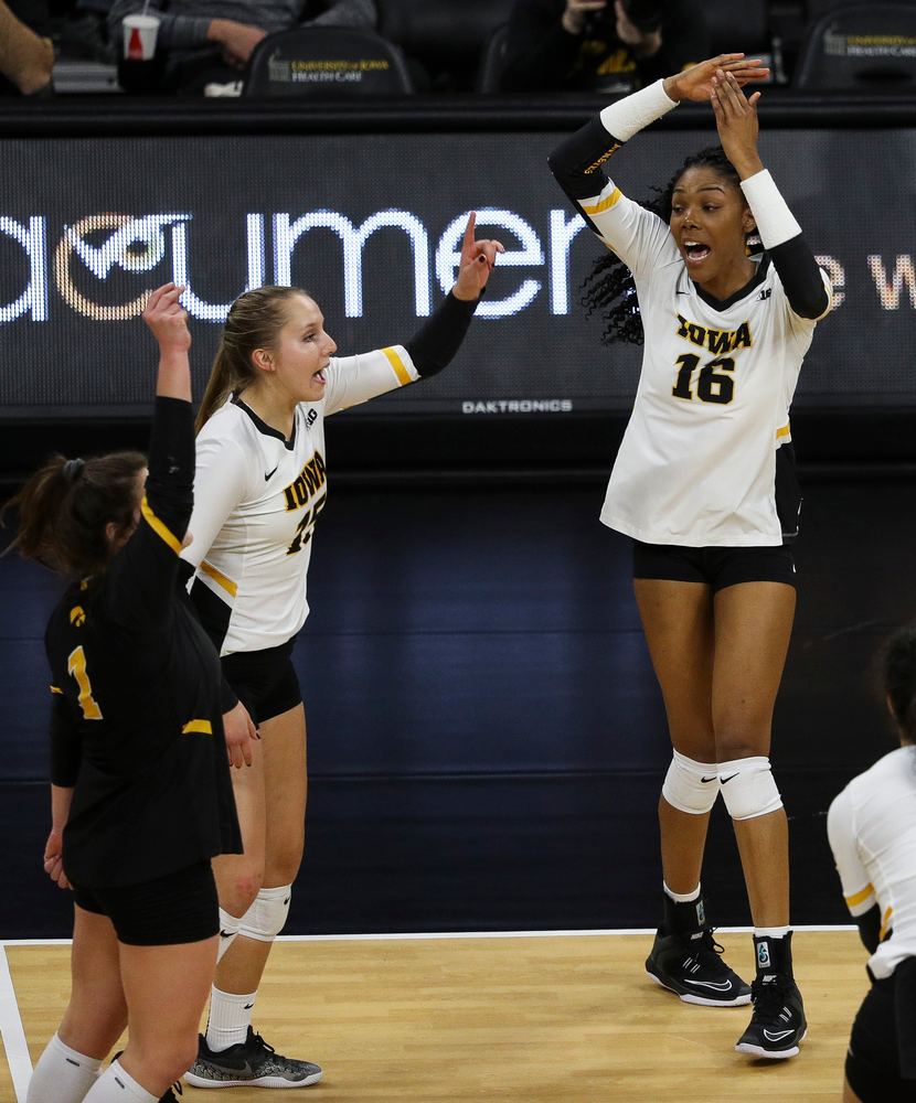 Iowa Hawkeyes outside hitter Taylor Louis (16) celebrates after winning a point during a match against Maryland at Carver-Hawkeye Arena on November 23, 2018. (Tork Mason/hawkeyesports.com)