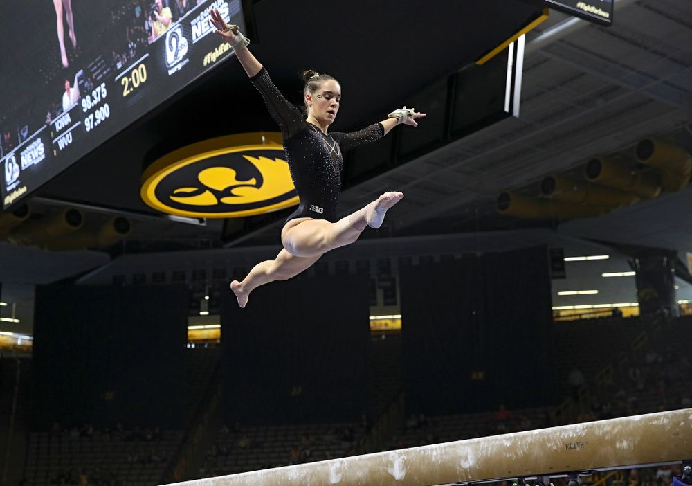 Iowa’s Allie Gilchrist competes on the beam during their meet at Carver-Hawkeye Arena in Iowa City on Sunday, March 8, 2020. (Stephen Mally/hawkeyesports.com)