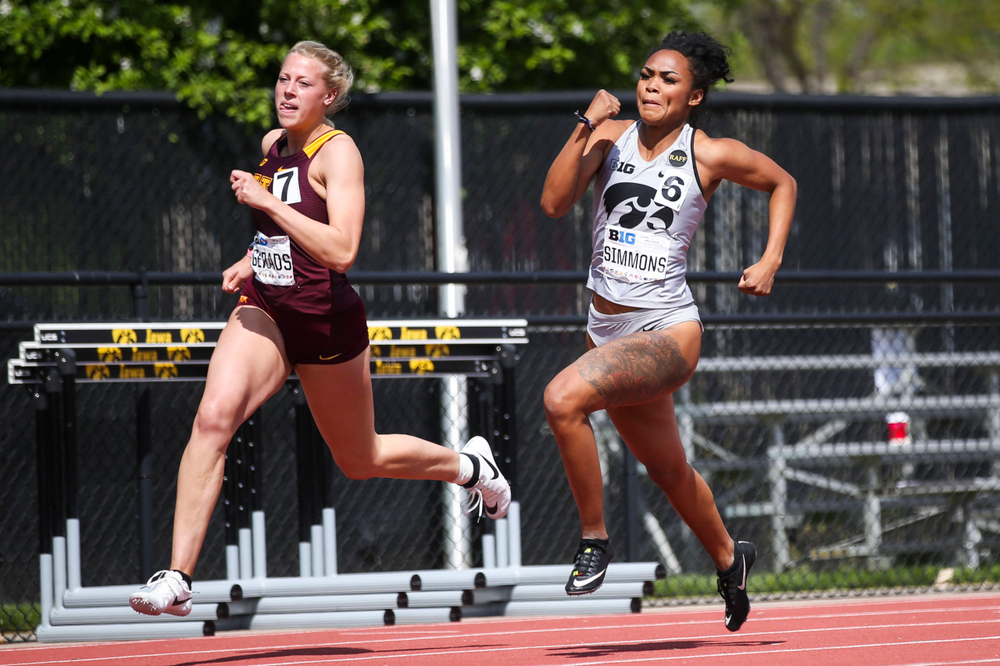 Iowa's Tria Simmons runs during the women's 200-meter dash at the Big Ten Outdoor Track and Field Championships at Francis X. Cretzmeyer Track on Friday, May 10, 2019. (Lily Smith/hawkeyesports.com)