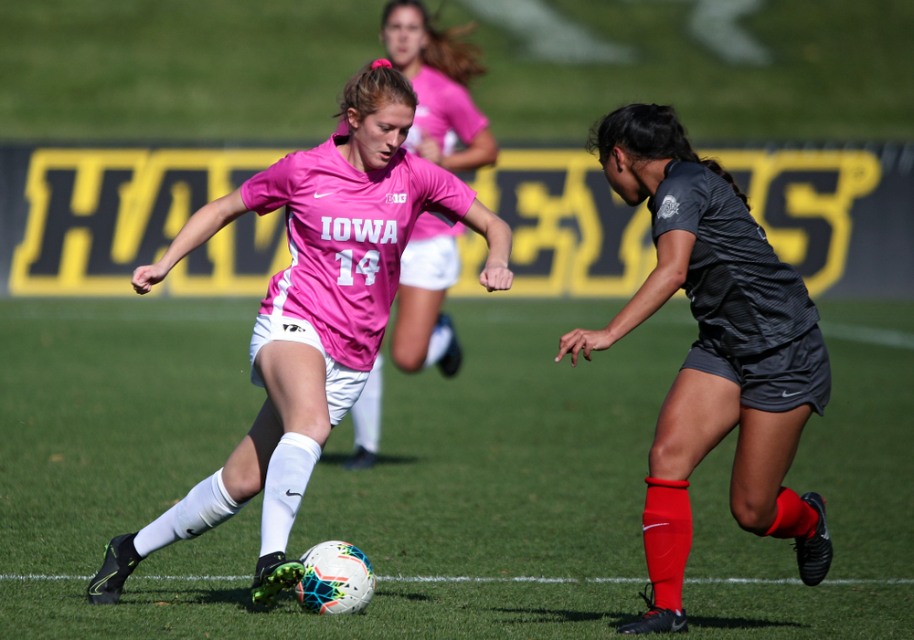 Iowa defender Leah Moss (14) moves with the ball during the first half of their match at the Iowa Soccer Complex in Iowa City on Sunday, Oct 27, 2019. (Stephen Mally/hawkeyesports.com)