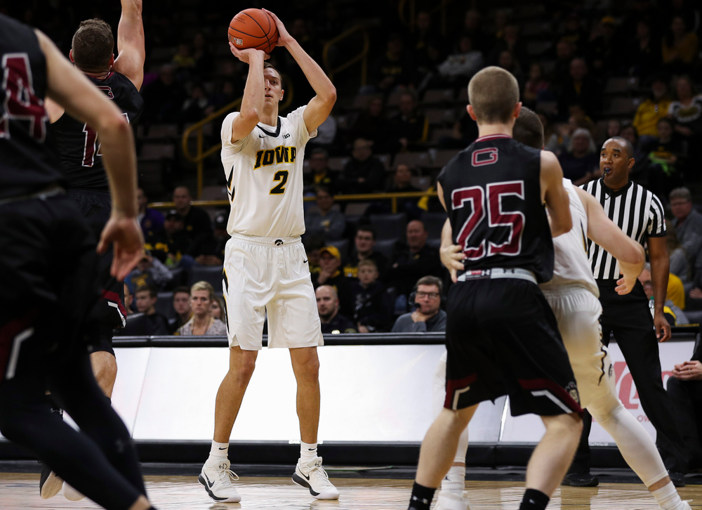 Iowa Hawkeyes forward Jack Nunge (2) puts up a 3-pointer during a game against Guilford College at Carver-Hawkeye Arena on November 4, 2018. (Tork Mason/hawkeyesports.com)