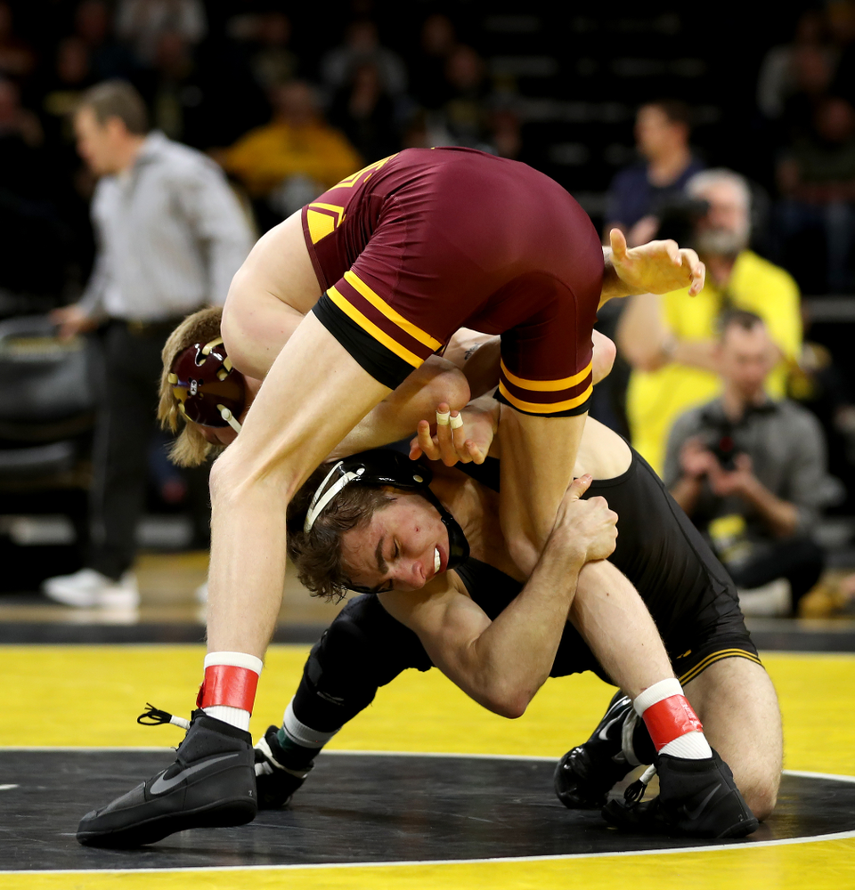 Iowa’s Austin DeSanto wrestles Minnesota’s Boo Dryden at 133 pounds Saturday, February 15, 2020 at Carver-Hawkeye Arena. DeSanto won the match 24-8. (Brian Ray/hawkeyesports.com)