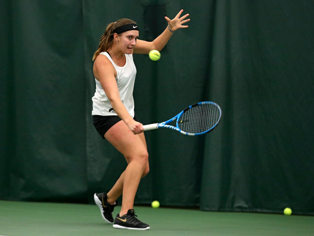 Iowa’s Ashleigh Jacobs returns a shot during her singles match at the Hawkeye Tennis and Recreation Complex in Iowa City on Sunday, February 23, 2020. (Stephen Mally/hawkeyesports.com)