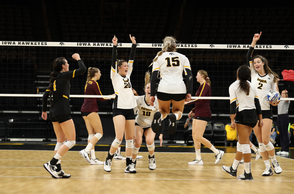 Iowa Hawkeyes outside hitter Edina Schmidt (20) and setter Courtney Buzzerio (2) against the Minnesota Golden Gophers Wednesday, October 2, 2019 at Carver-Hawkeye Arena. (Brian Ray/hawkeyesports.com)