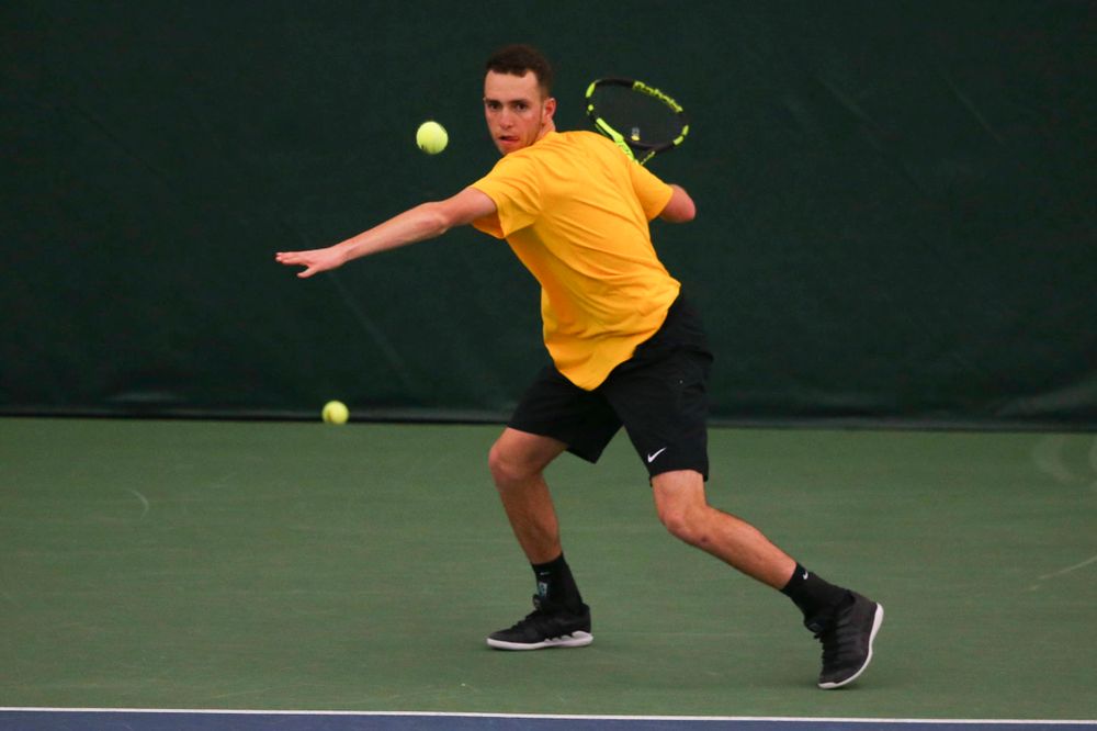 Iowa's Kareem Allaf at a tennis match vs Drake Friday, March 8, 2019 at the Hawkeye Tennis and Recreation Complex. (Lily Smith/hawkeyesports.com)