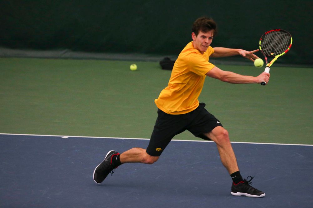 Iowa's Joe Tyler at a tennis match vs Drake Friday, March 8, 2019 at the Hawkeye Tennis and Recreation Complex. (Lily Smith/hawkeyesports.com)