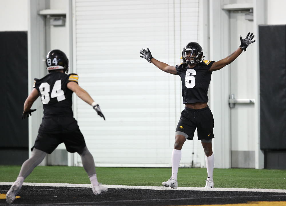 Iowa Hawkeyes wide receiver Ihmir Smith-Marsette (6) and wide receiver Nick Easley (84) during preparation for the 2019 Outback Bowl Tuesday, December 18, 2018 at the Hansen Football Performance Center. (Brian Ray/hawkeyesports.com)
