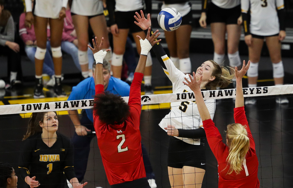 Iowa Hawkeyes outside hitter Meghan Buzzerio (5) spikes the ball during a match against Maryland at Carver-Hawkeye Arena on November 23, 2018. (Tork Mason/hawkeyesports.com)