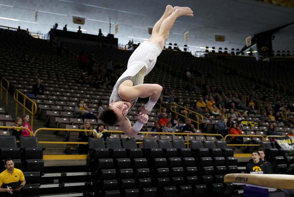 Iowa’s Mitch Mandozzi competes on the vault against Illinois Sunday, March 1, 2020 at Carver-Hawkeye Arena. (Brian Ray/hawkeyesports.com)