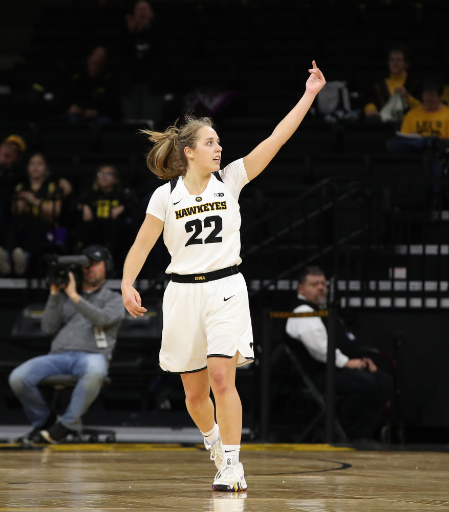 Iowa Hawkeyes guard Kathleen Doyle (22) pumps up the crowd against the Wisconsin Badgers Monday, January 7, 2019 at Carver-Hawkeye Arena. (Brian Ray/hawkeyesports.com)