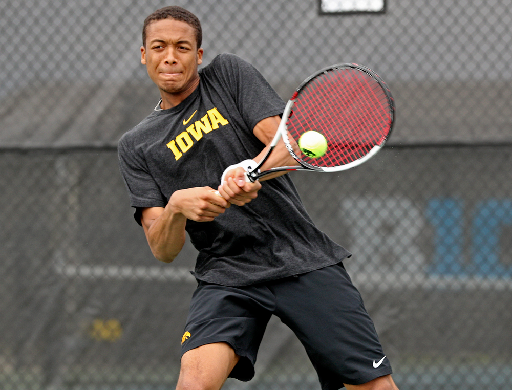 Iowa's Oliver Okonkwo competes during a double match against Ohio State at the Hawkeye Tennis and Recreation Complex in Iowa City on Sunday, Apr. 7, 2019. (Stephen Mally/hawkeyesports.com)
