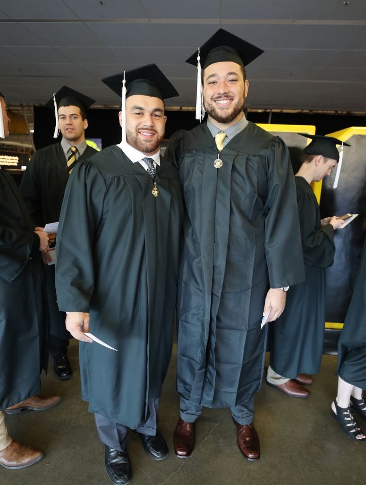 Iowa Football's Austin Kelly and Dalton Ferguson during the Fall Commencement Ceremony Saturday, December 15, 2018 at Carver-Hawkeye Arena. (Brian Ray/hawkeyesports.com)