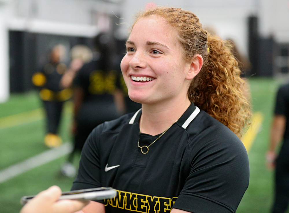 Iowa catcher/infielder Kate Claypool (12) answers questions during Iowa Softball Media Day at the Hawkeye Tennis and Recreation Complex in Iowa City on Thursday, January 30, 2020. (Stephen Mally/hawkeyesports.com)