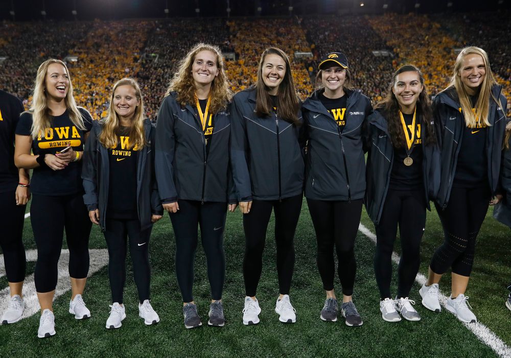 Members of the Iowa rowing team are recognized by the Presidential Committee on Athletics at halftime during a game against Wisconsin on September 22, 2018. (Tork Mason/hawkeyesports.com)