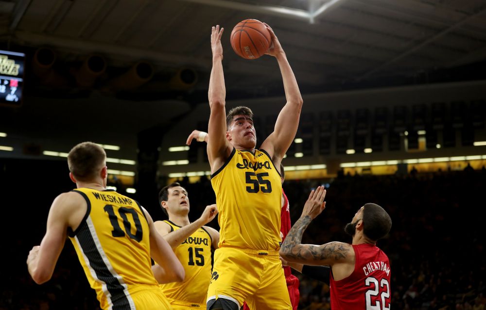 Iowa Hawkeyes forward Luka Garza (55) grabs a rebound against the Nebraska Cornhuskers Saturday, February 8, 2020 at Carver-Hawkeye Arena. (Brian Ray/hawkeyesports.com)