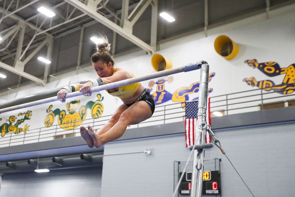 Maddie Kampschroeder performs on the uneven bars during the Iowa women’s gymnastics Black and Gold Intraquad Meet on Saturday, December 7, 2019 at the UI Field House. (Lily Smith/hawkeyesports.com)