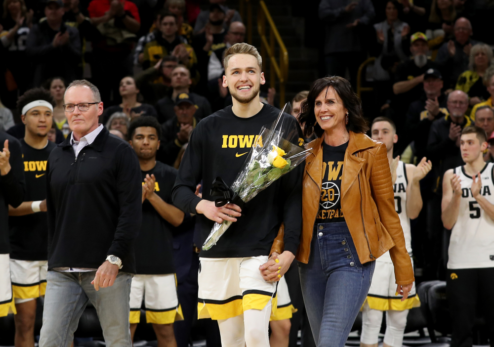 Iowa Hawkeyes forward Riley Till (20) and his family during senior night festivities before their game against the Purdue Boilermakers Tuesday, March 3, 2020 at Carver-Hawkeye Arena. (Brian Ray/hawkeyesports.com)
