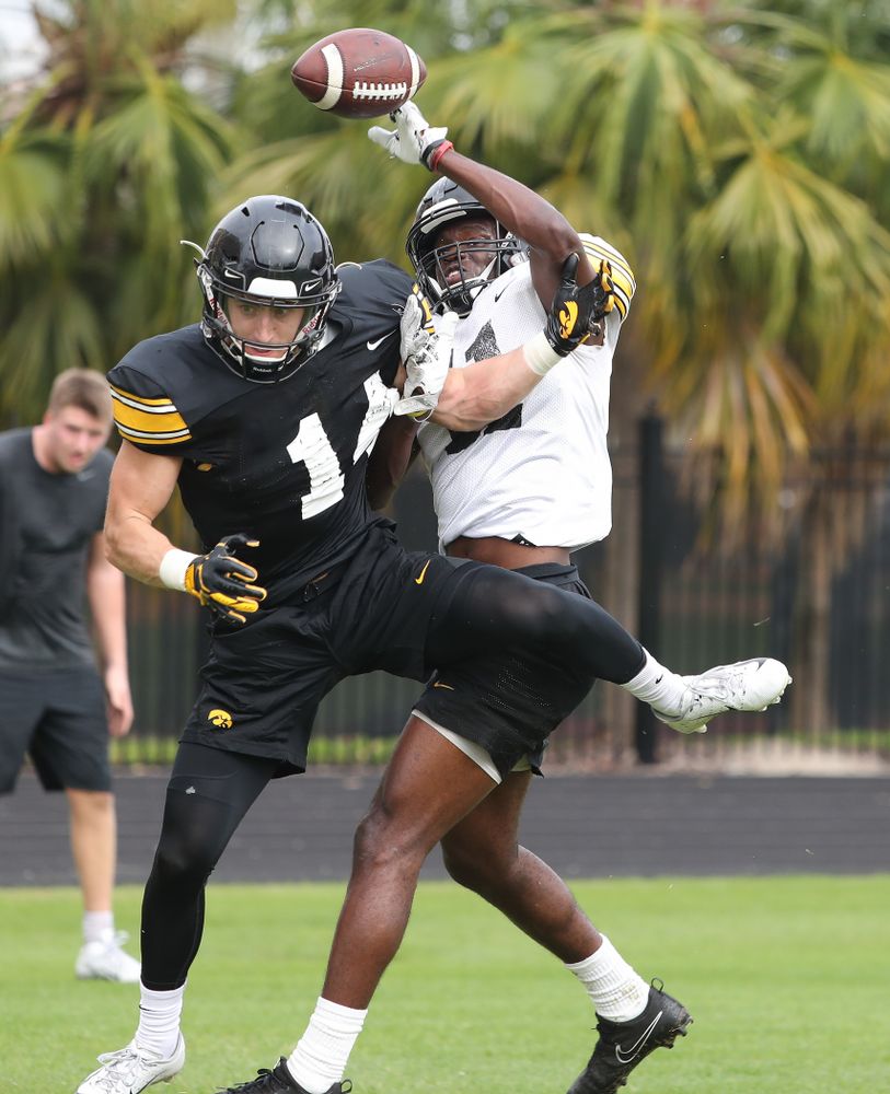 Iowa Hawkeyes wide receiver Kyle Groeneweg (14) and defensive back Michael Ojemudia (11) as the team prepares for the Outback Bowl Saturday, December 29, 2018 at Tampa University. (Brian Ray/hawkeyesports.com)