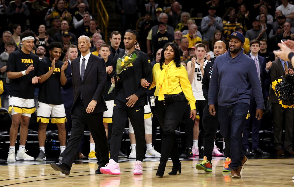 Iowa Hawkeyes guard Bakari Evelyn (4) and his family during senior night festivities before their game against the Purdue Boilermakers Tuesday, March 3, 2020 at Carver-Hawkeye Arena. (Brian Ray/hawkeyesports.com)