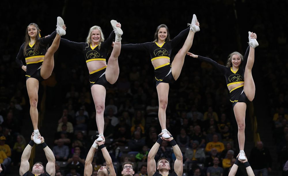 The Iowa Cheerleaders and Dance Team perform on senior night at half-time of the Iowa Hawkeyes game against the Purdue Boilermakers Tuesday, March 3, 2020 at Carver-Hawkeye Arena. (Brian Ray/hawkeyesports.com)