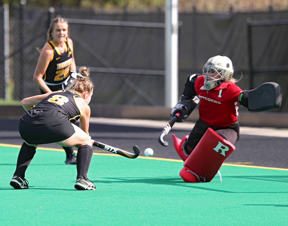 Iowa’s Nikki Freeman (8) lines up a shot during the first quarter of their match at Grant Field in Iowa City on Friday, Oct 4, 2019. (Stephen Mally/hawkeyesports.com)
