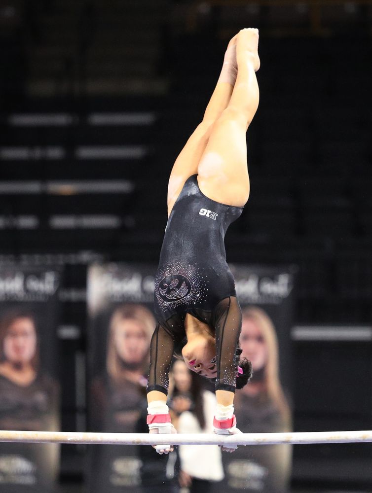 Iowa's Clair Kaji competes on the bars during their meet against the Minnesota Golden Gophers Saturday, January 19, 2019 at Carver-Hawkeye Arena. (Brian Ray/hawkeyesports.com)