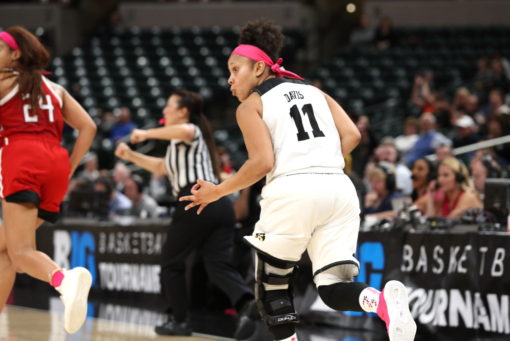 Iowa Hawkeyes guard Makenzie Meyer (3) celebrates a three point basket against the Rutgers Scarlet Knights in the semi-finals of the Big Ten Tournament Saturday, March 9, 2019 at Bankers Life Fieldhouse in Indianapolis, Ind. (Brian Ray/hawkeyesports.com)