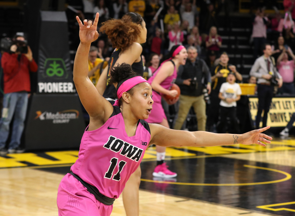 Iowa Hawkeyes guard Tania Davis (11) celebrates their victory against the seventh ranked Maryland Terrapins Sunday, February 17, 2019 at Carver-Hawkeye Arena. (Brian Ray/hawkeyesports.com)