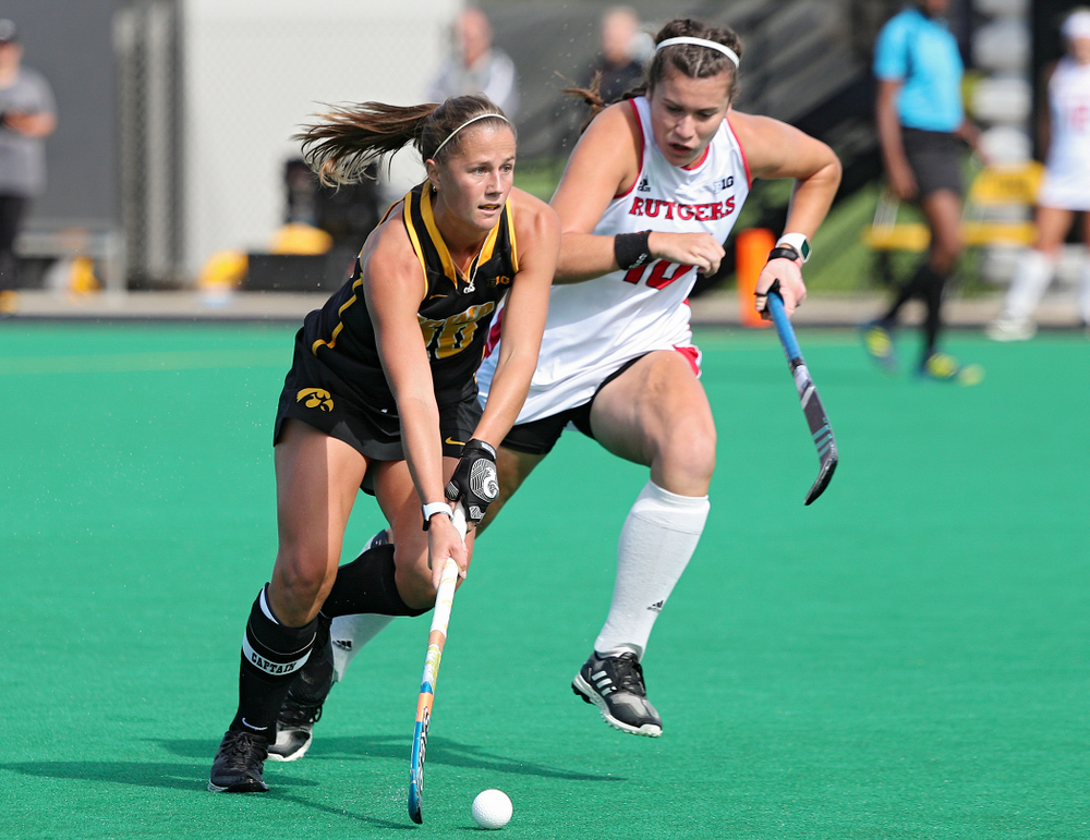 Iowa’s Sophie Sunderland (20) moves with the ball during the first quarter of their match at Grant Field in Iowa City on Friday, Oct 4, 2019. (Stephen Mally/hawkeyesports.com)