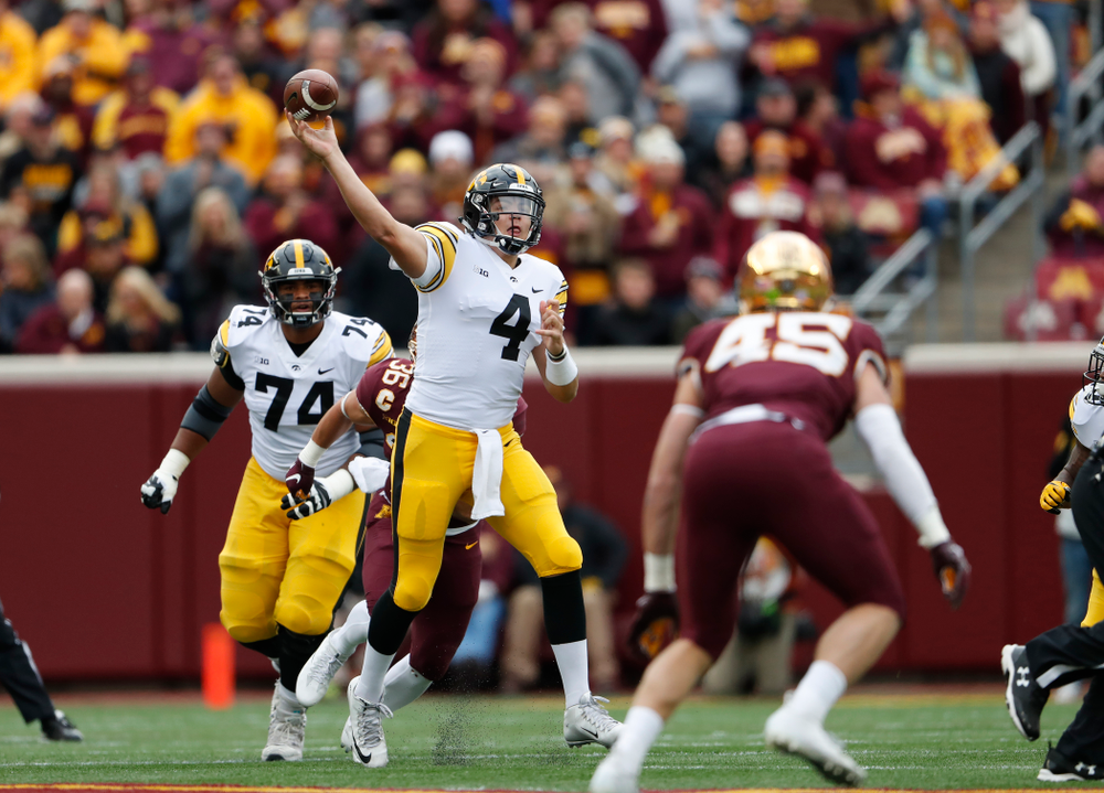 Iowa Hawkeyes quarterback Nate Stanley (4) throws a touchdown pass to wide receiver Ihmir Smith-Marsette (6) against the Minnesota Golden Gophers Saturday, October 6, 2018 at TCF Bank Stadium. (Brian Ray/hawkeyesports.com)