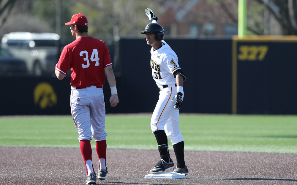Iowa Hawkeyes infielder Matthew Sosa (31) doubles against the Nebraska Cornhuskers Saturday, April 20, 2019 at Duane Banks Field. (Brian Ray/hawkeyesports.com)