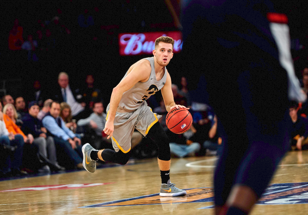 Iowa Hawkeyes guard Jordan Bohannon (3) against UConn in the Championship game of the 2K Empire Classic Friday, November 16, 2018 at Madison Square Garden in New York City. (Duncan H.Williams/Freelance)