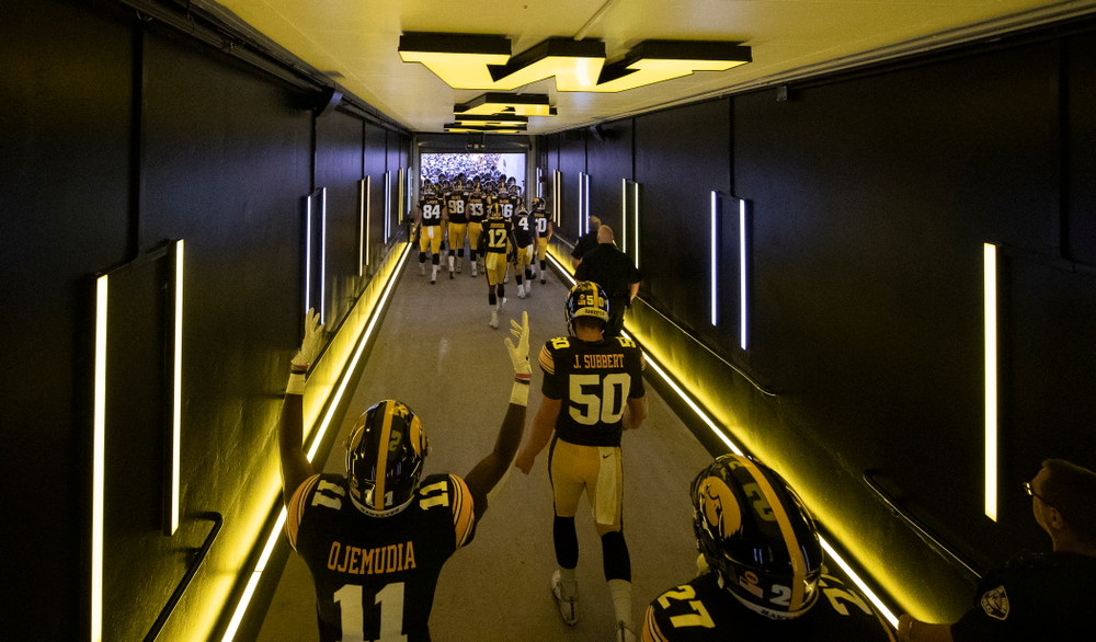 The Iowa Hawkeyes take the field in their new home tunnel before their game against the Miami RedHawks Saturday, August 31, 2019 at Kinnick Stadium in Iowa City. (Brian Ray/hawkeyesports.com)