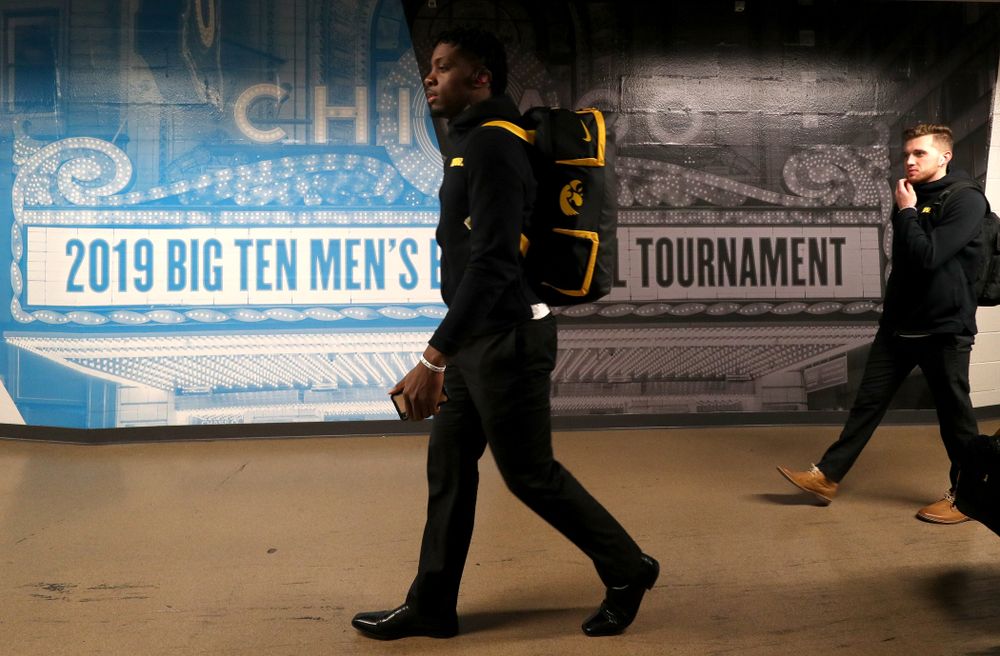 Iowa Hawkeyes forward Tyler Cook (25) arrives for their game against the Illinois Fighting Illini in the 2019 Big Ten Men's Basketball Tournament Thursday, March 14, 2019 at the United Center in Chicago. (Brian Ray/hawkeyesports.com)