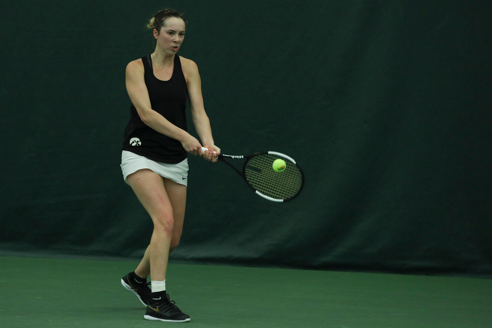 Iowa’s Samantha Mannix returns a hit during the Iowa women’s tennis meet vs DePaul on Friday, February 21, 2020 at the Hawkeye Tennis and Recreation Complex. (Lily Smith/hawkeyesports.com)