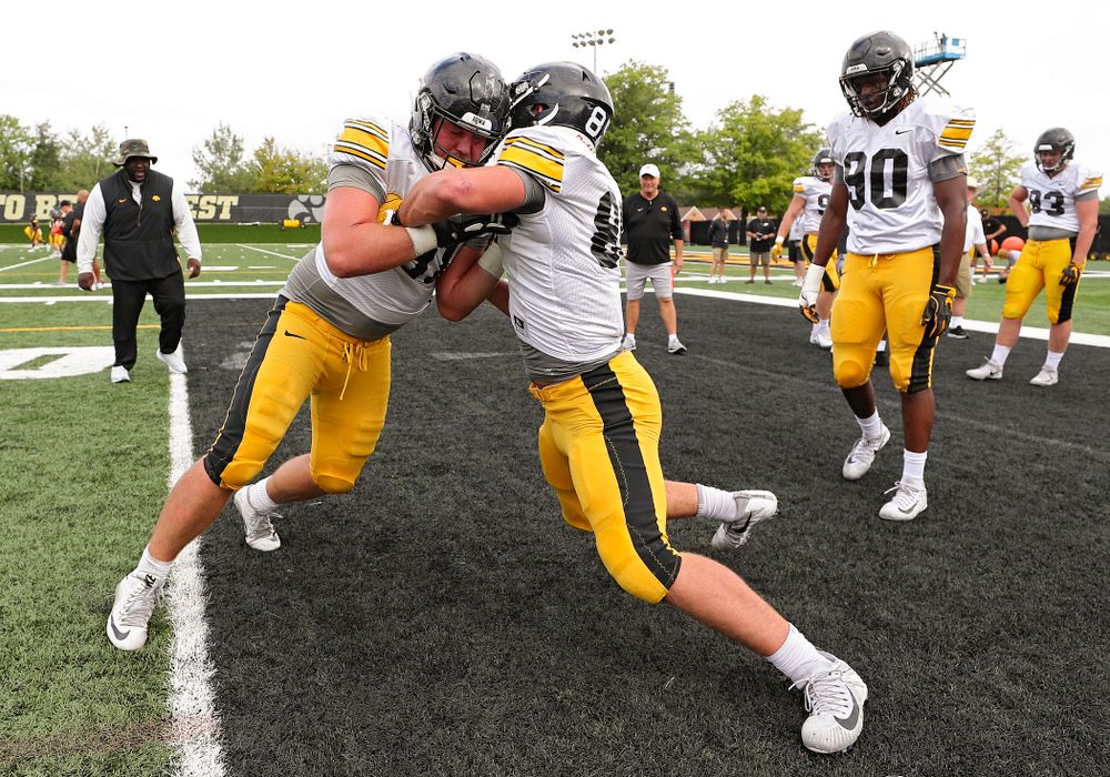 Iowa Hawkeyes defensive lineman Brady Reiff (91) and defensive end Logan Lee (85) run a drill during Fall Camp Practice No. 10 at the Hansen Football Performance Center in Iowa City on Tuesday, Aug 13, 2019. (Stephen Mally/hawkeyesports.com)