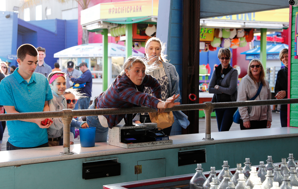 Iowa Hawkeyes forward Carly Mohns (34) plays games in Pacific Park on the Santa Monica Pier Thursday, March 15, 2018 in Santa Monica. (Brian Ray/hawkeyesports.com)