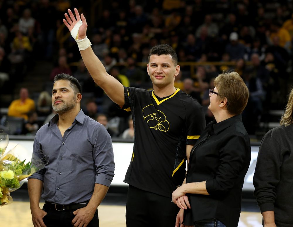 The Iowa Cheerleaders and Dance Team perform on senior night at half-time of the Iowa Hawkeyes game against the Purdue Boilermakers Tuesday, March 3, 2020 at Carver-Hawkeye Arena. (Brian Ray/hawkeyesports.com)