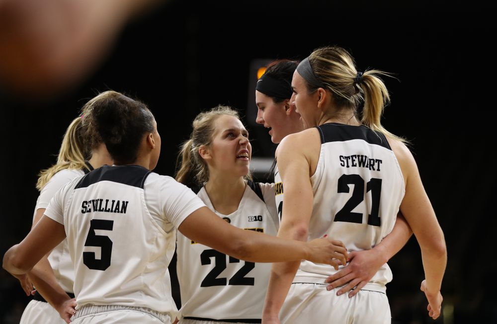 Iowa Hawkeyes forward Megan Gustafson (10), guard Kathleen Doyle (22), forward Hannah Stewart (21), guard Alexis Sevillian (5), and Makenzie Meyer against the Nebraska Cornhuskers Thursday, January 3, 2019 at Carver-Hawkeye Arena. (Brian Ray/hawkeyesports.com)