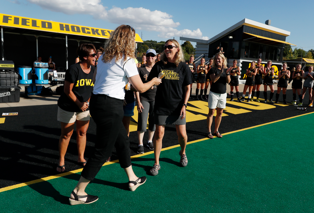 Former members of the Iowa Field Hockey team receive their letters following the Iowa Hawkeyes game against the Penn Quakers Friday, September 14, 2018 at Grant Field. (Brian Ray/hawkeyesports.com)