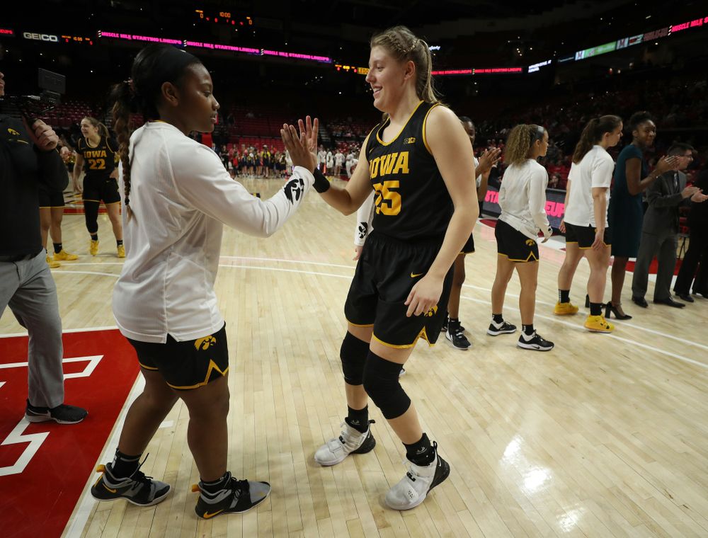 Iowa Hawkeyes forward/center Monika Czinano (25) and guard Zion Sanders (21) against the Maryland Terrapins Thursday, February 13, 2020 at the Xfinity Center in College Park, MD. (Brian Ray/hawkeyesports.com)