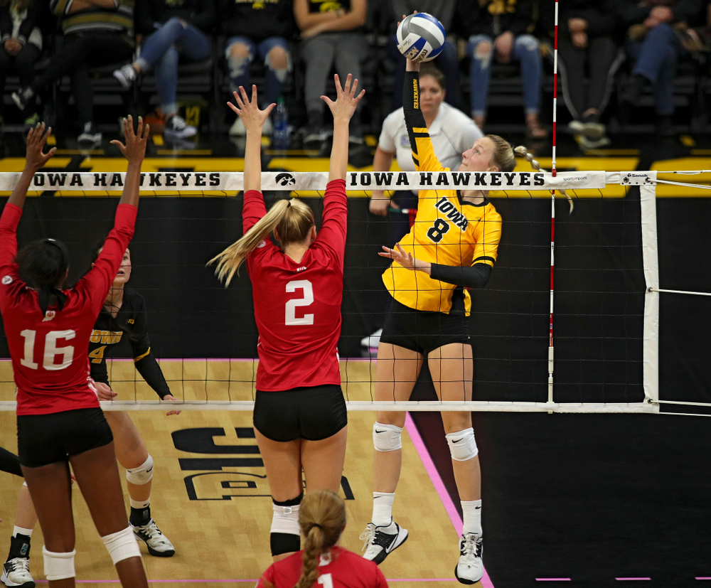Iowa’s Kyndra Hansen (8) gets a kill during their match at Carver-Hawkeye Arena in Iowa City on Sunday, Oct 20, 2019. (Stephen Mally/hawkeyesports.com)