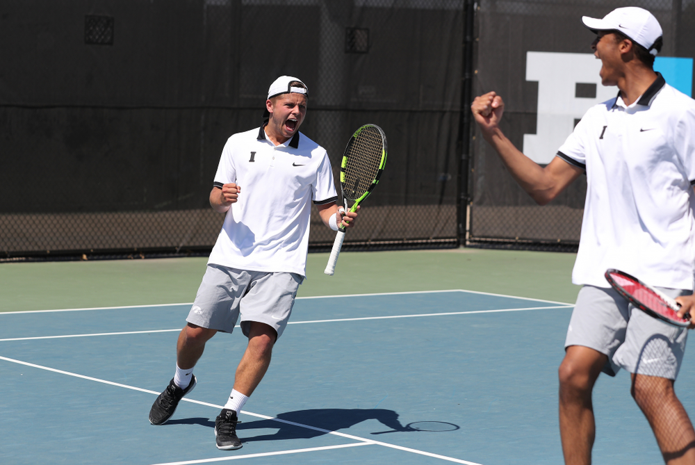 IowaÕs Oliver Okonkwo and Will Davies play a doubles match against the Michigan Wolverines Sunday, April 21, 2019 at the Hawkeye Tennis and Recreation Complex. (Brian Ray/hawkeyesports.com)