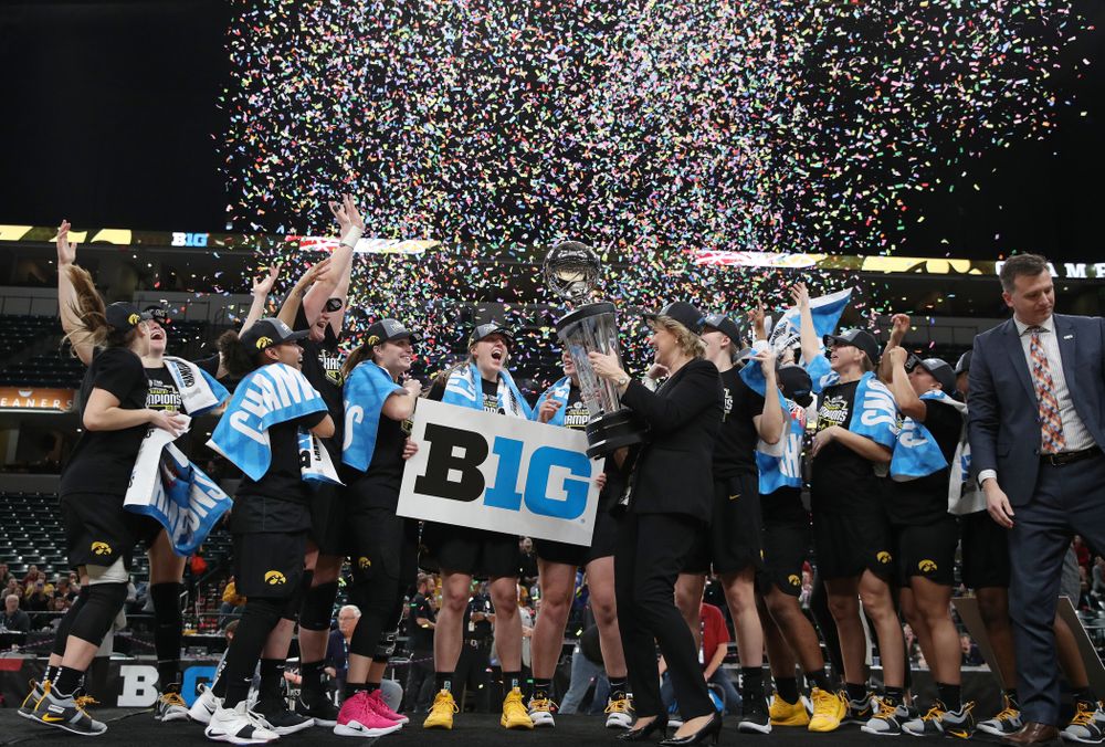 The Iowa Hawkeyes celebrate their victory overthe Maryland Terrapins in the Big Ten Championship Game Sunday, March 10, 2019 at Bankers Life Fieldhouse in Indianapolis, Ind. (Brian Ray/hawkeyesports.com)